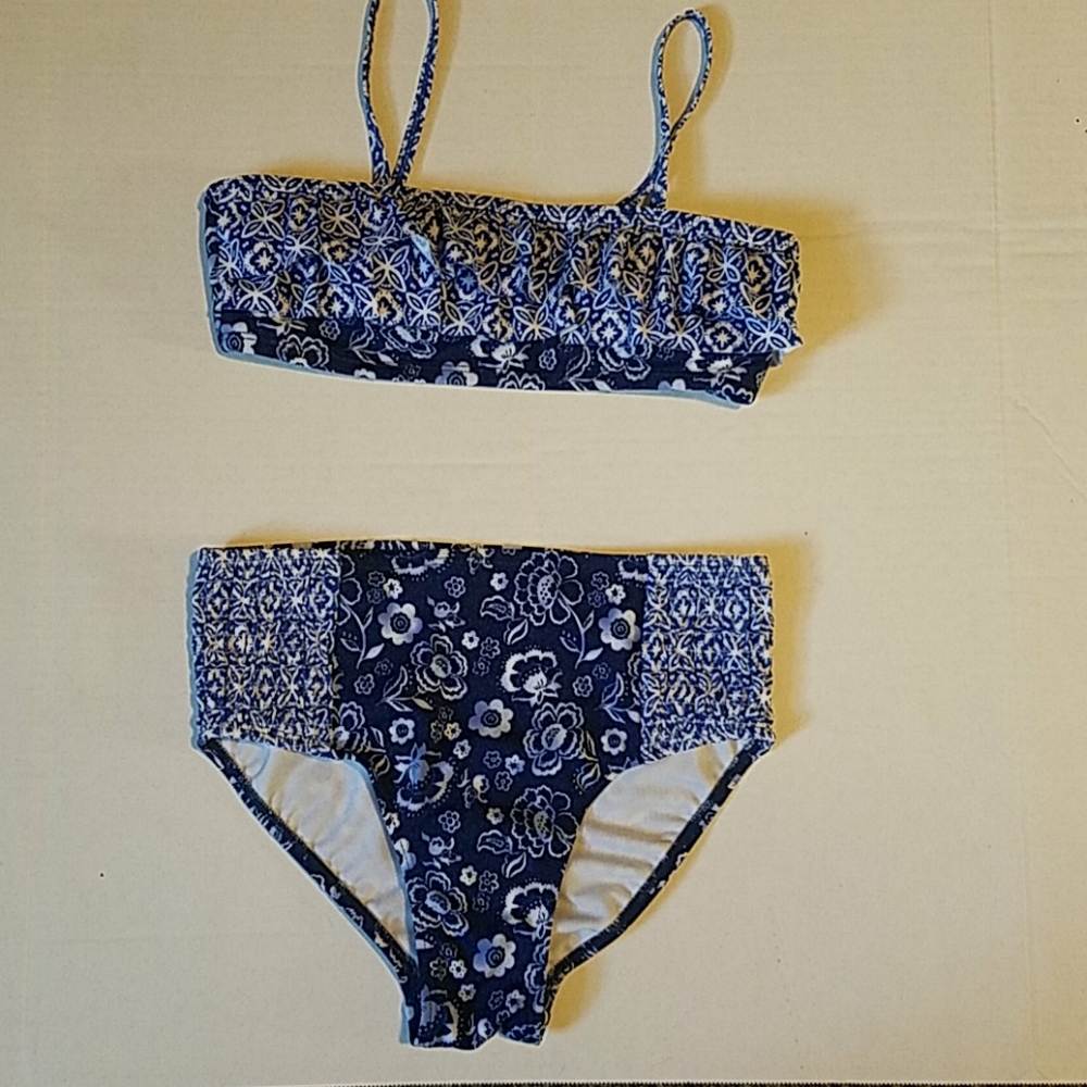 A blue and white bikini two piece. By Justice.